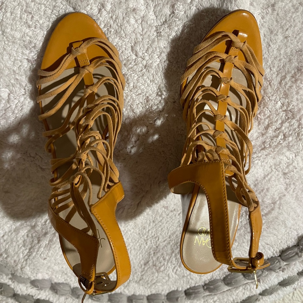 Joan & David Tan Wedge Sandals with Intricate Cut-Out Design